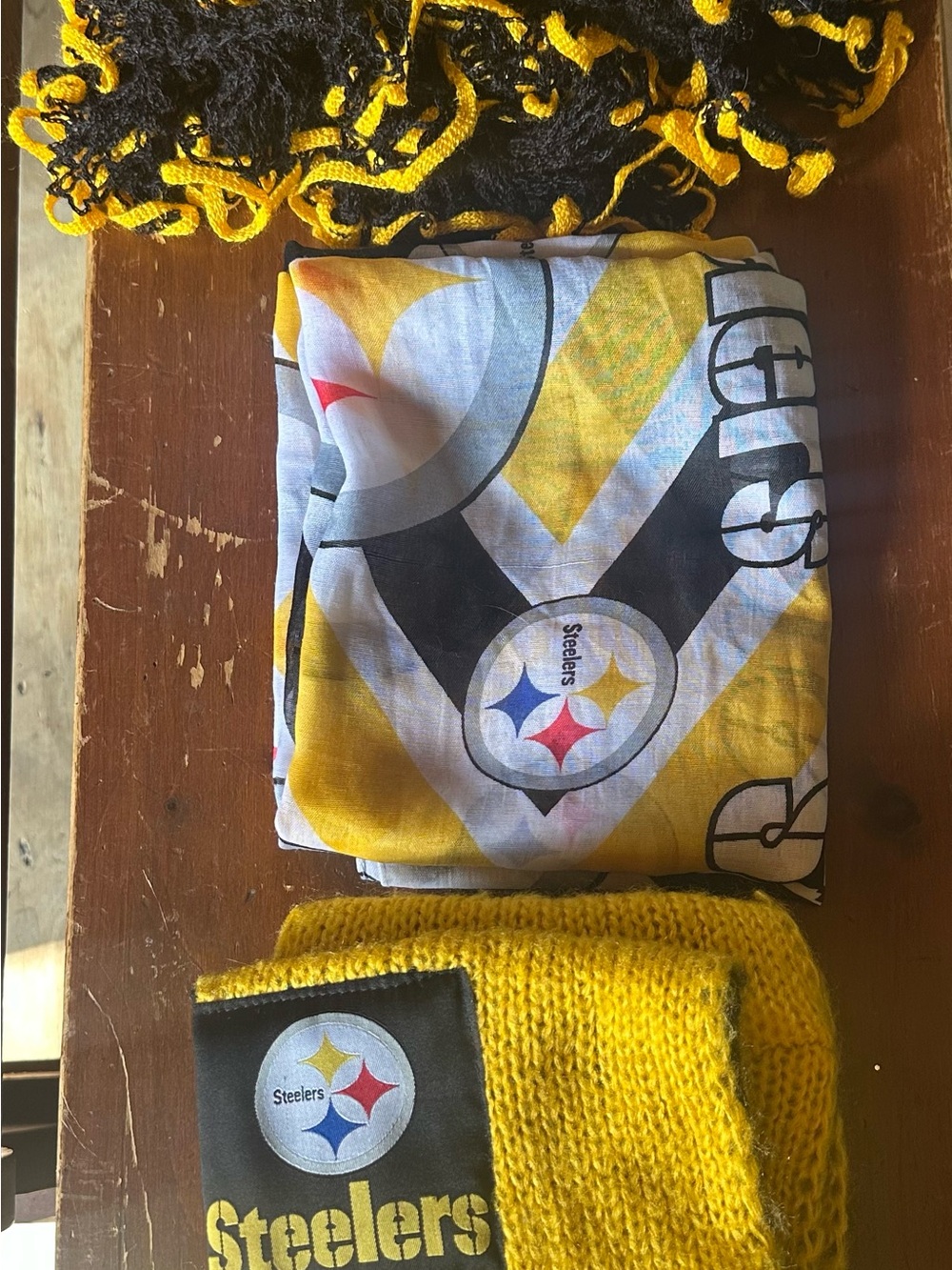 2 Pittsburgh Steelers scarfs and 1 just black and yellow